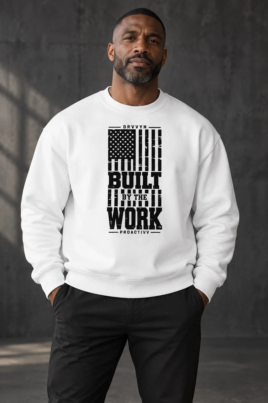 DRVVYN Proactivv Built By The Work — unisex crewneck, front view on model