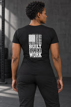 DRVVYN Proactivv Built By The Work — womens performance tee, back view on model