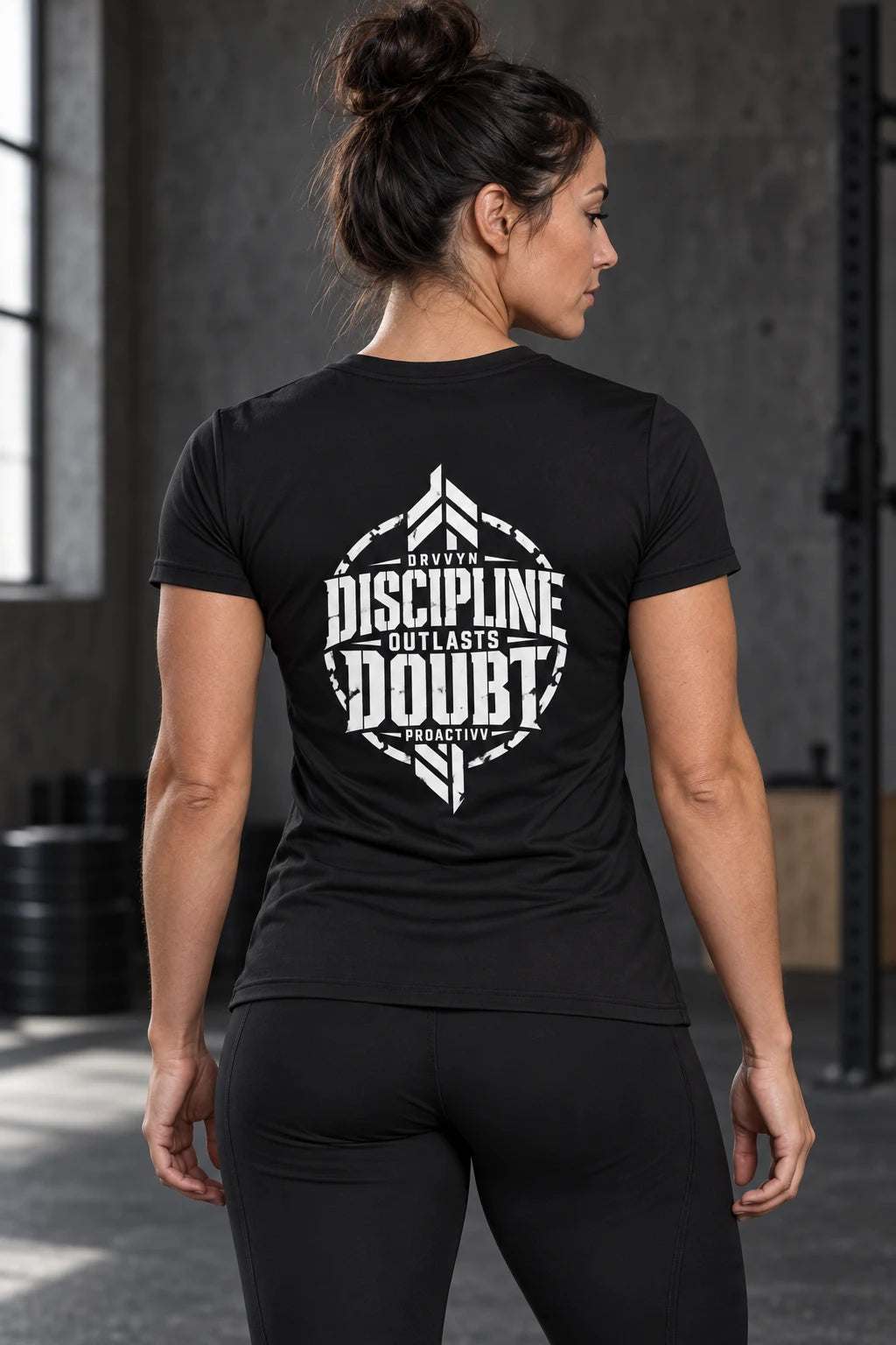 DRVVYN Proactivv Discipline Outlasts Doubt — womens performance tee, back view on model