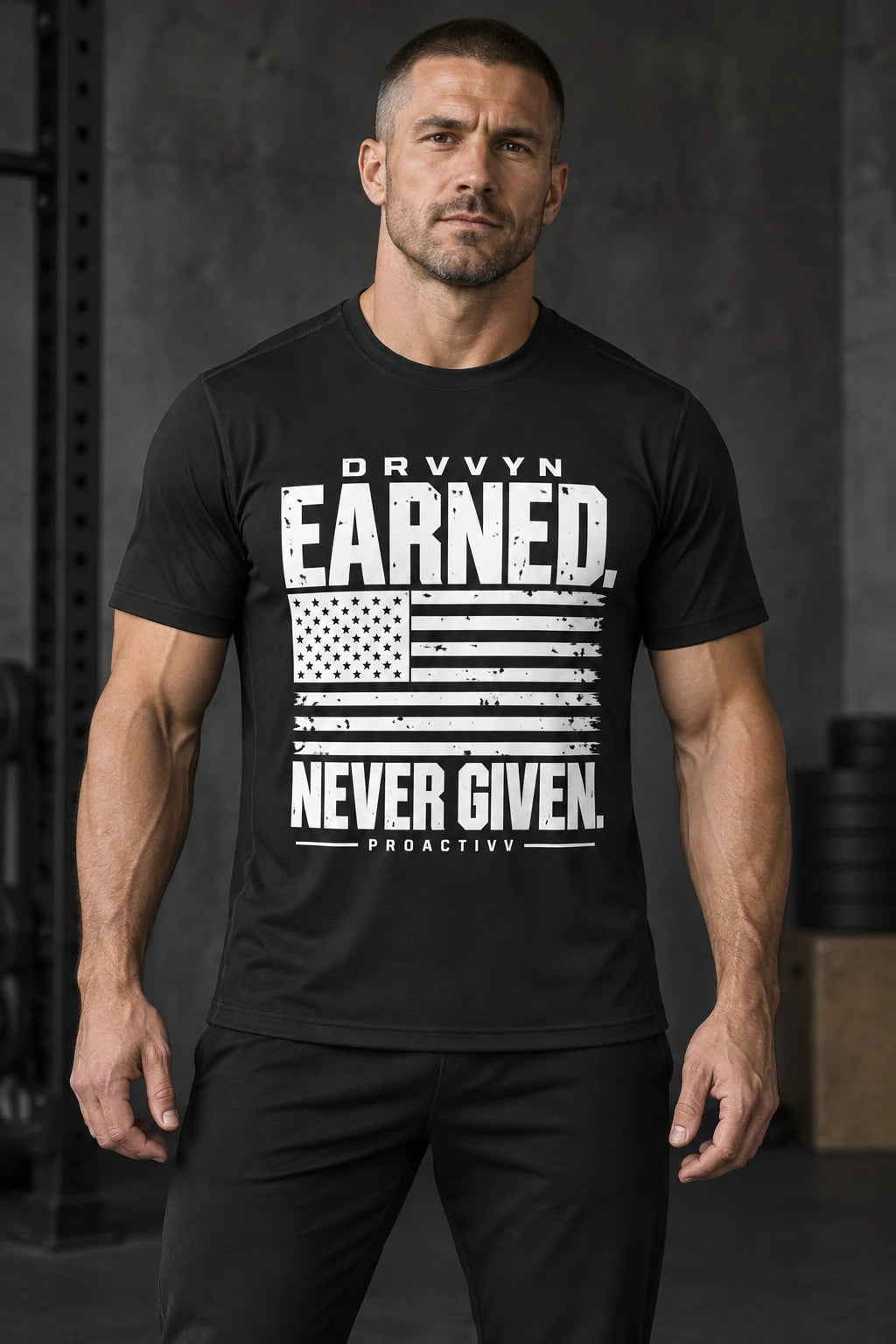 DRVVYN Proactivv Earned Never Given — mens performance tee, front view on model