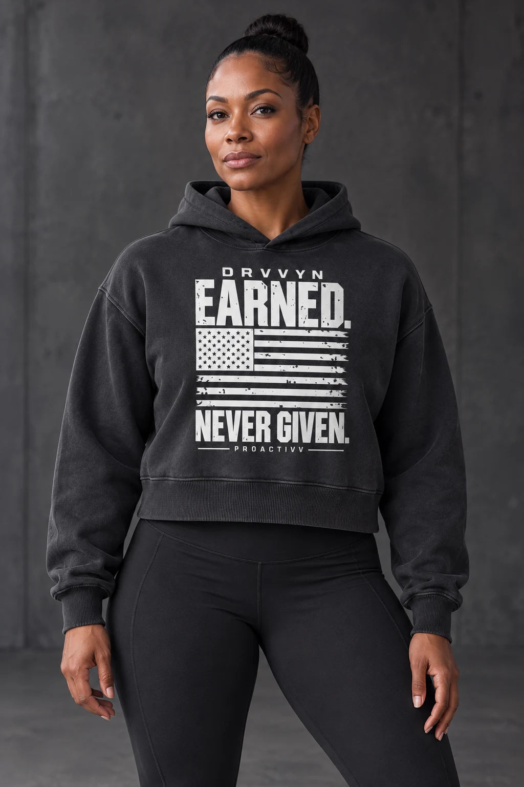 DRVVYN Proactivv Earned Never Given — womens hoodie, front view on model