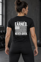 DRVVYN Proactivv Earned Never Given — womens performance tee, back view on model
