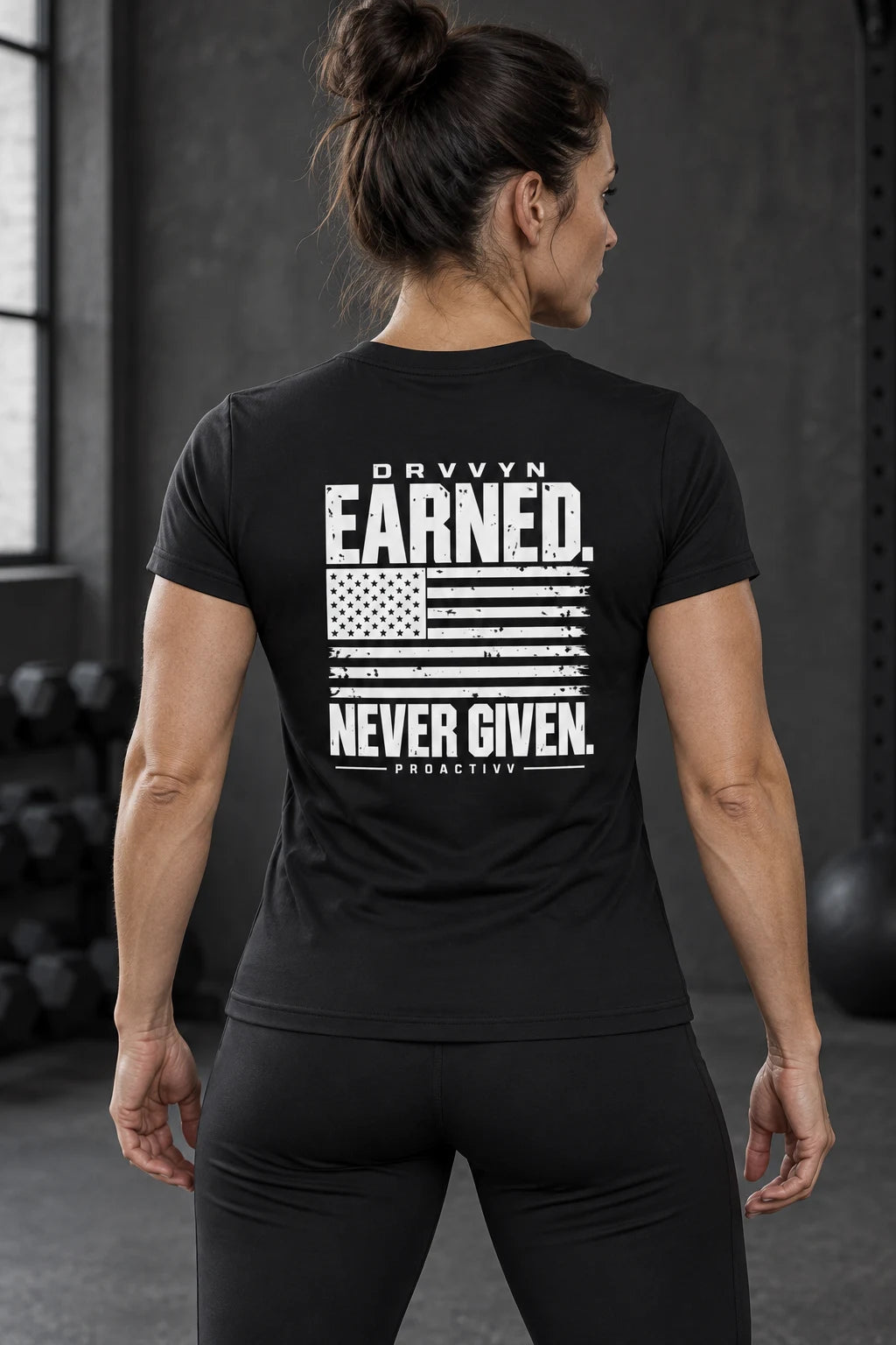 DRVVYN Proactivv Earned Never Given — womens performance tee, back view on model