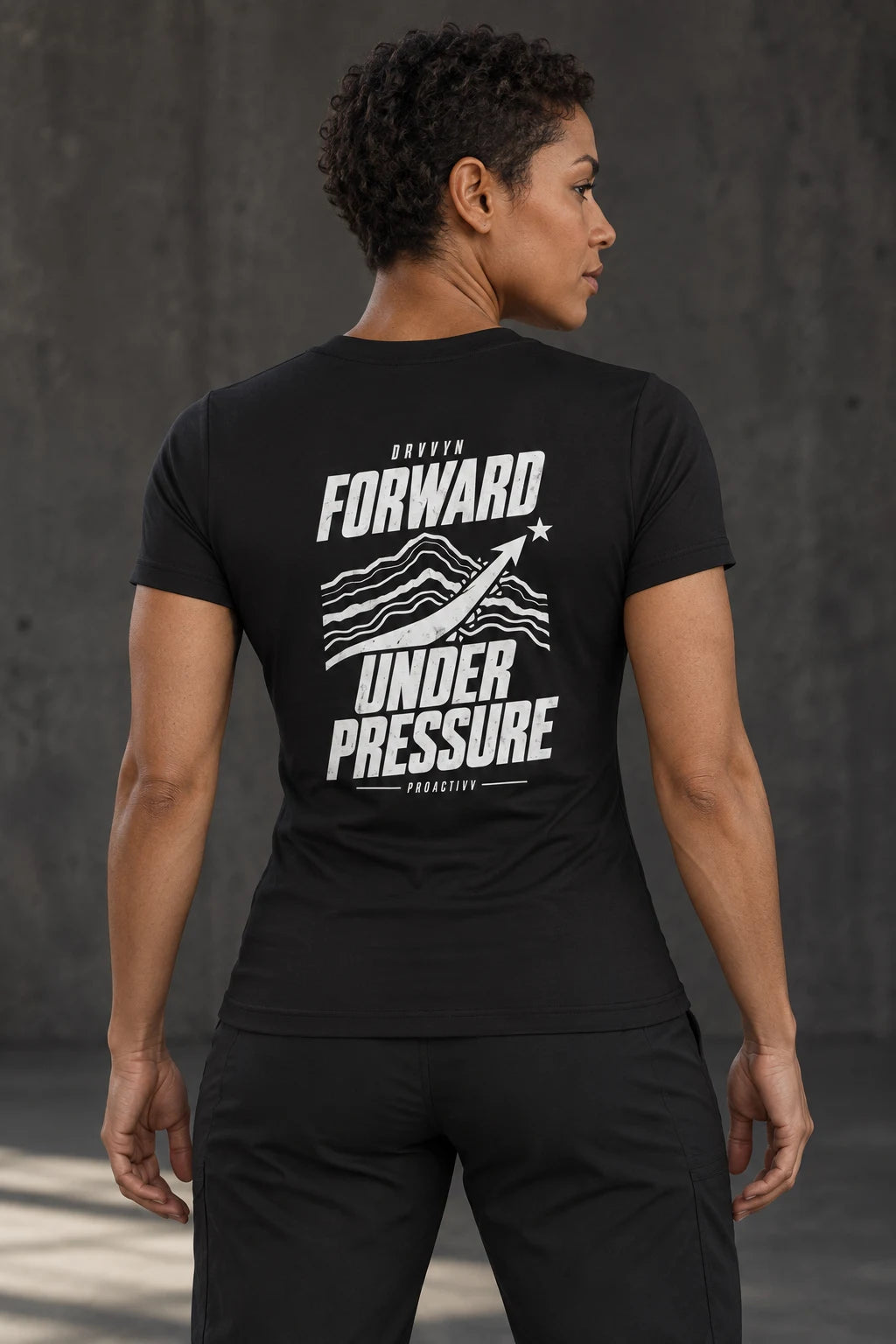 DRVVYN Proactivv Forward Under Pressure — womens performance tee, back view on model