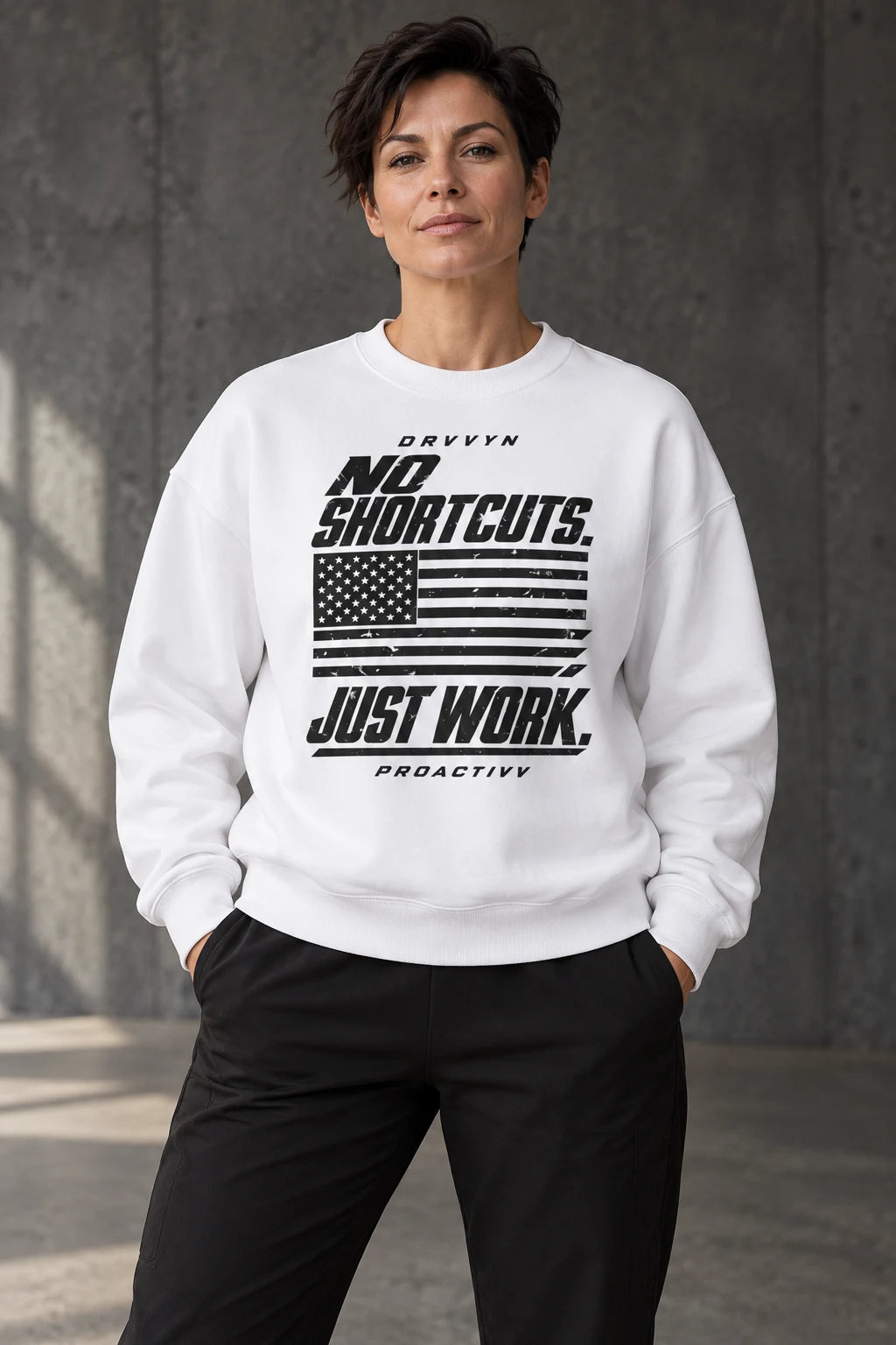 DRVVYN Proactivv No Shortcuts Just Work — unisex crewneck, front view on model