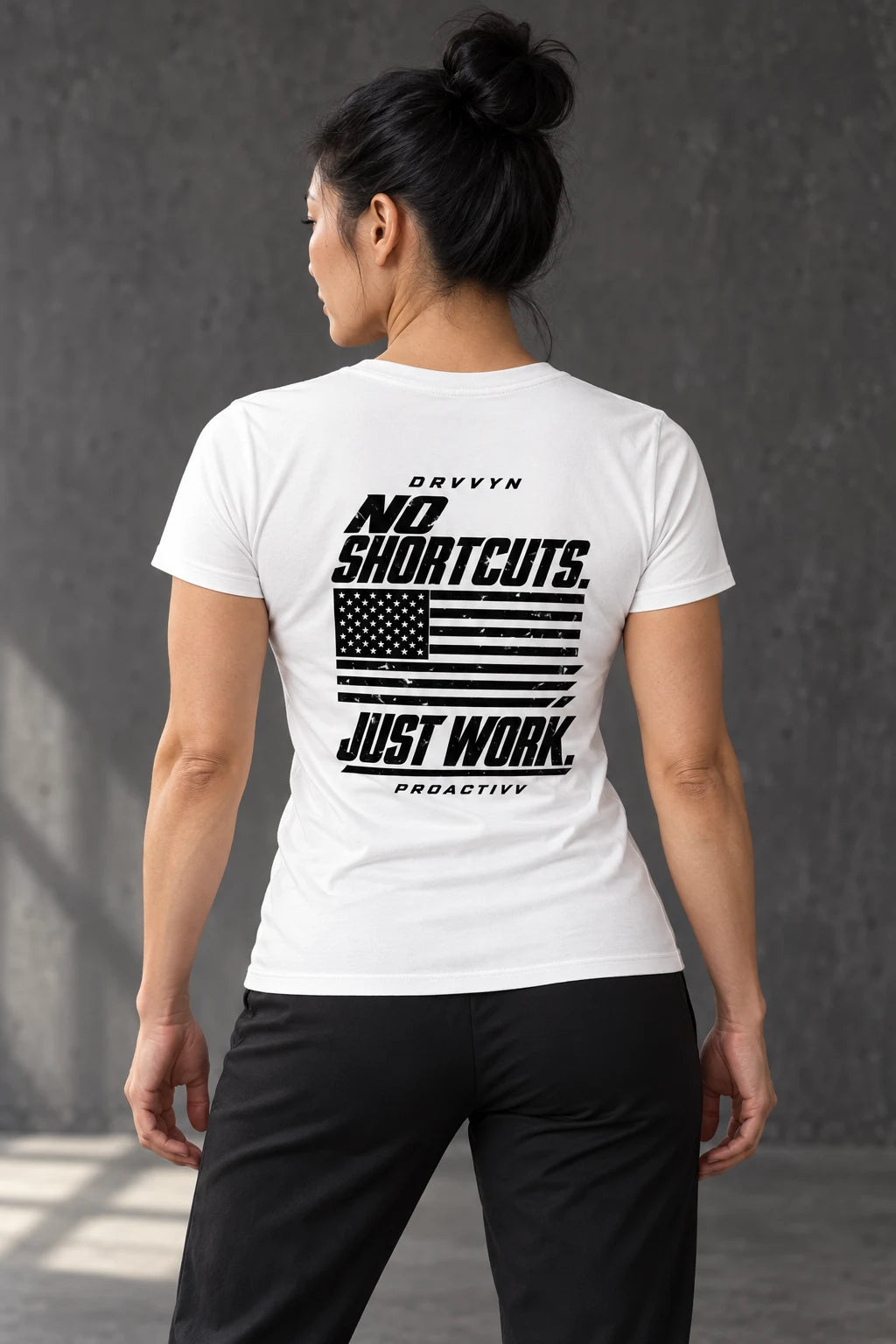 DRVVYN Proactivv No Shortcuts Just Work — womens performance tee, back view on model